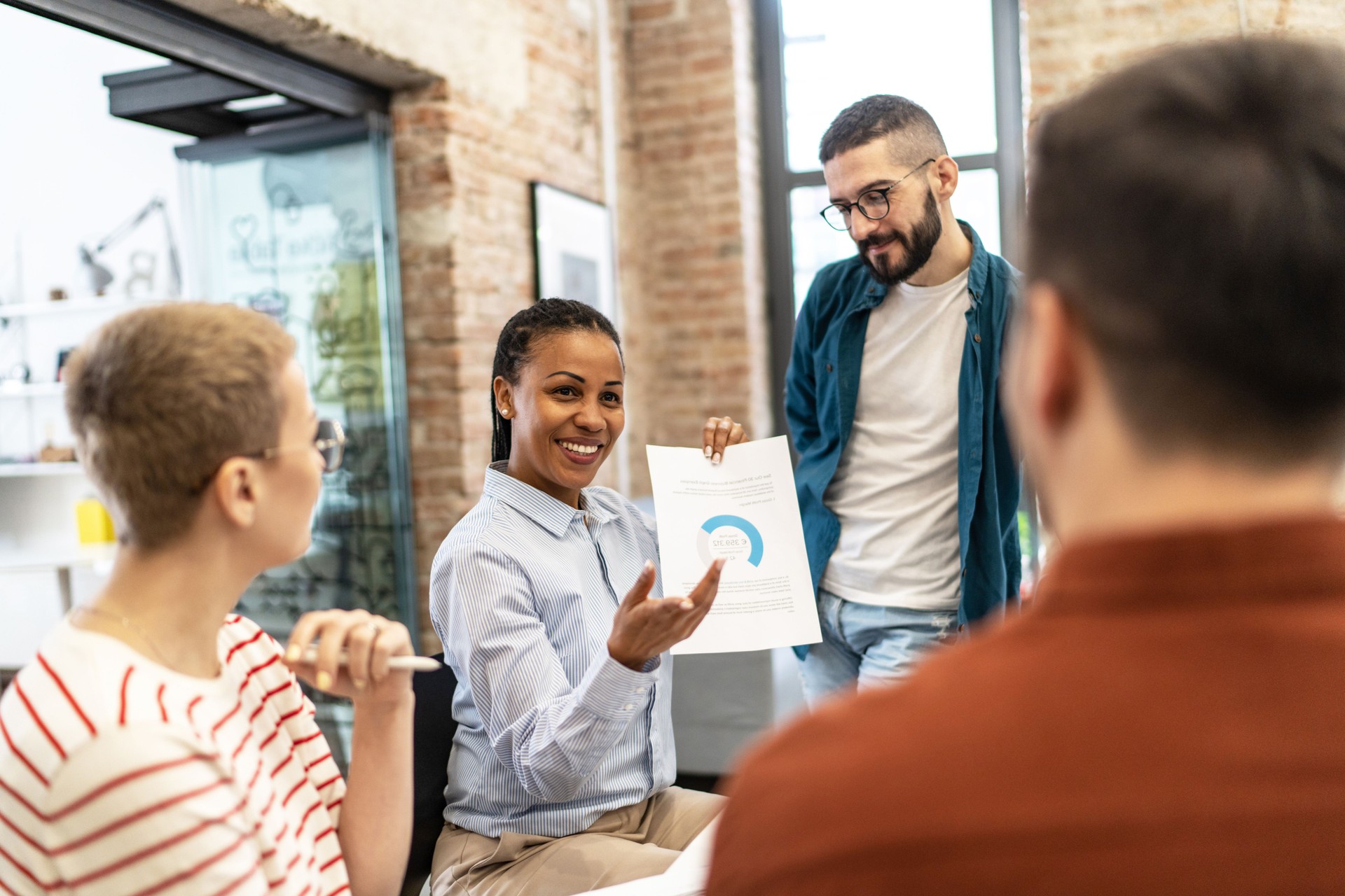 Business people sharing ideas in a meeting at the office